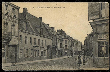 La rue de Lille &agrave; Valencienens sur une carte postaale ancienne